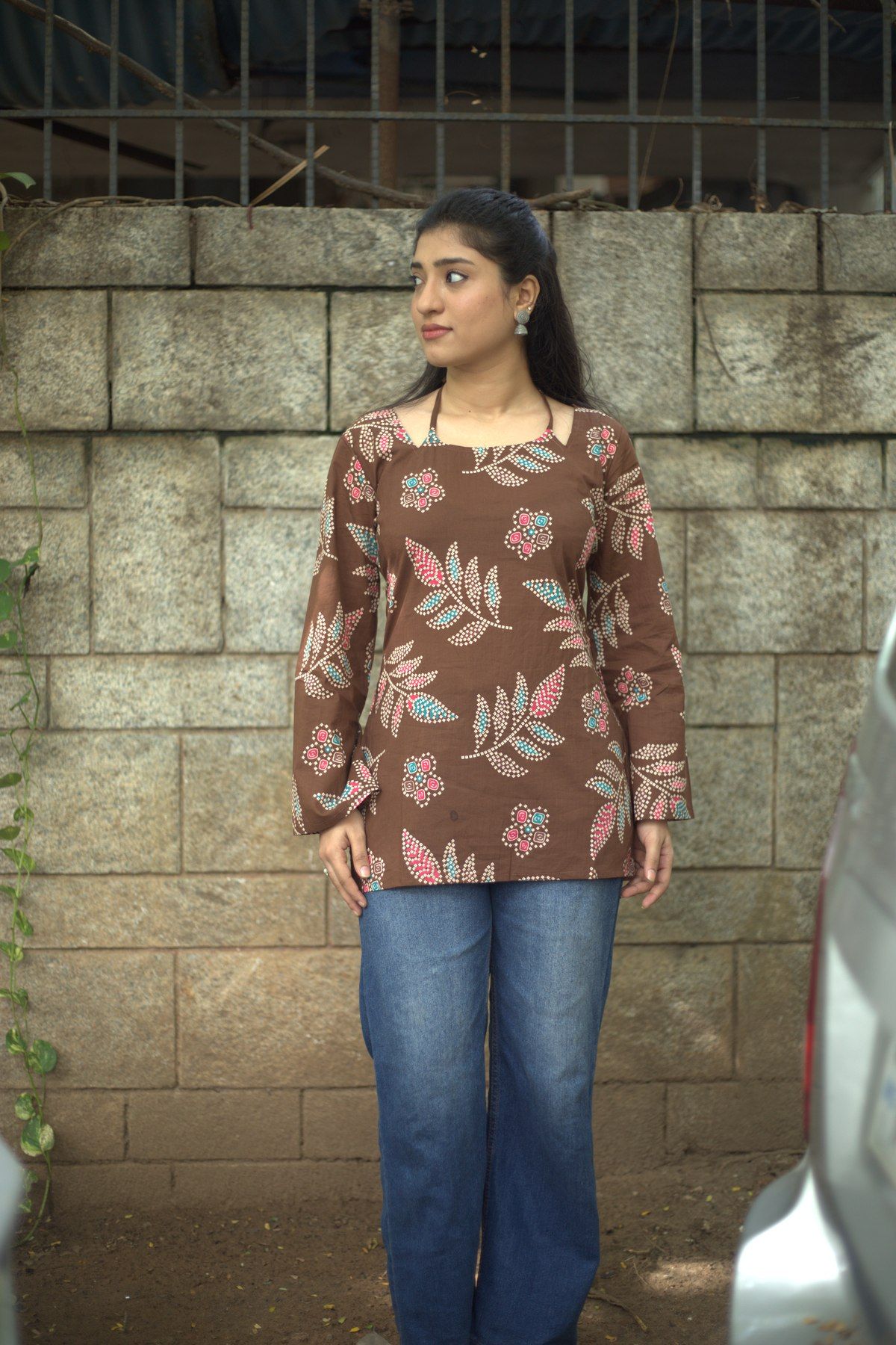 Standing view showing the full length and sleeve shape
