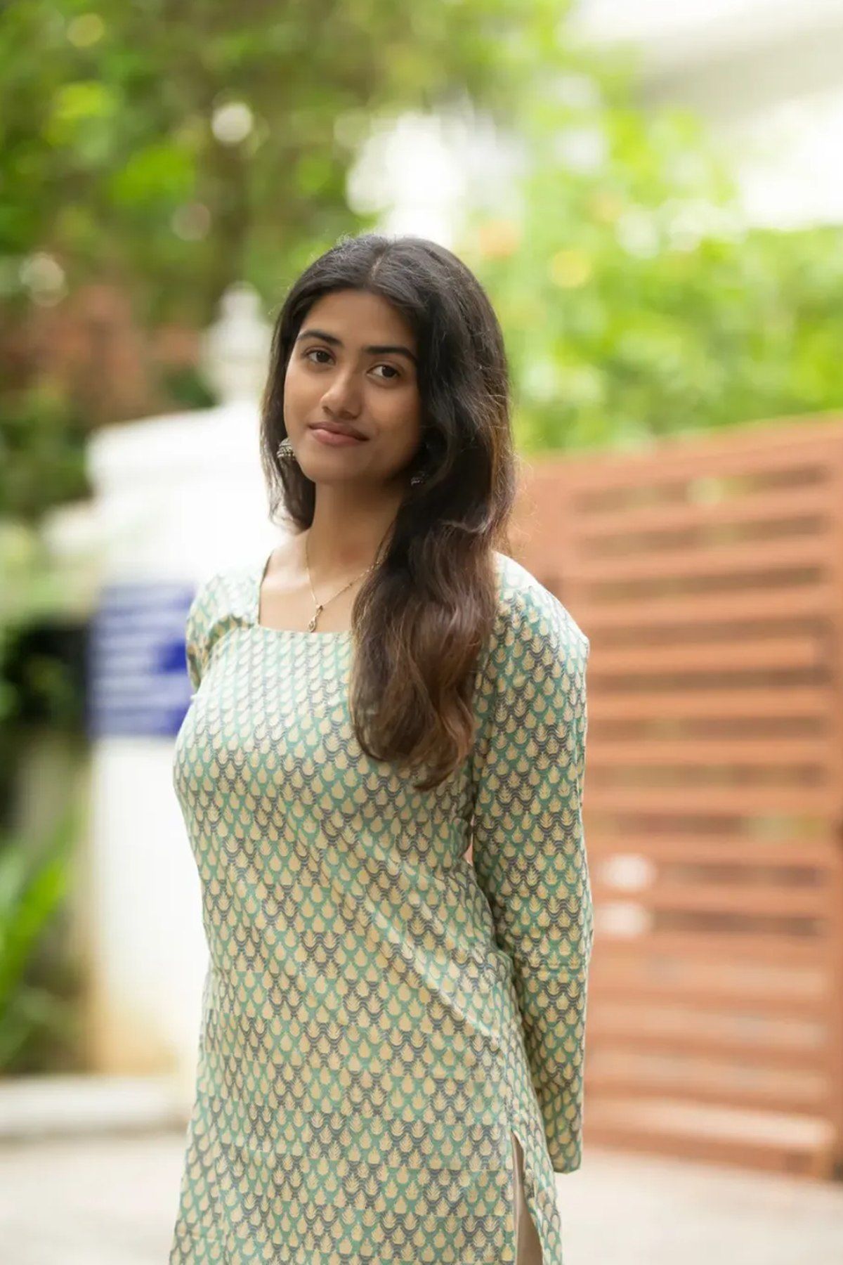 Sage scallop-print top, close view of the square neckline