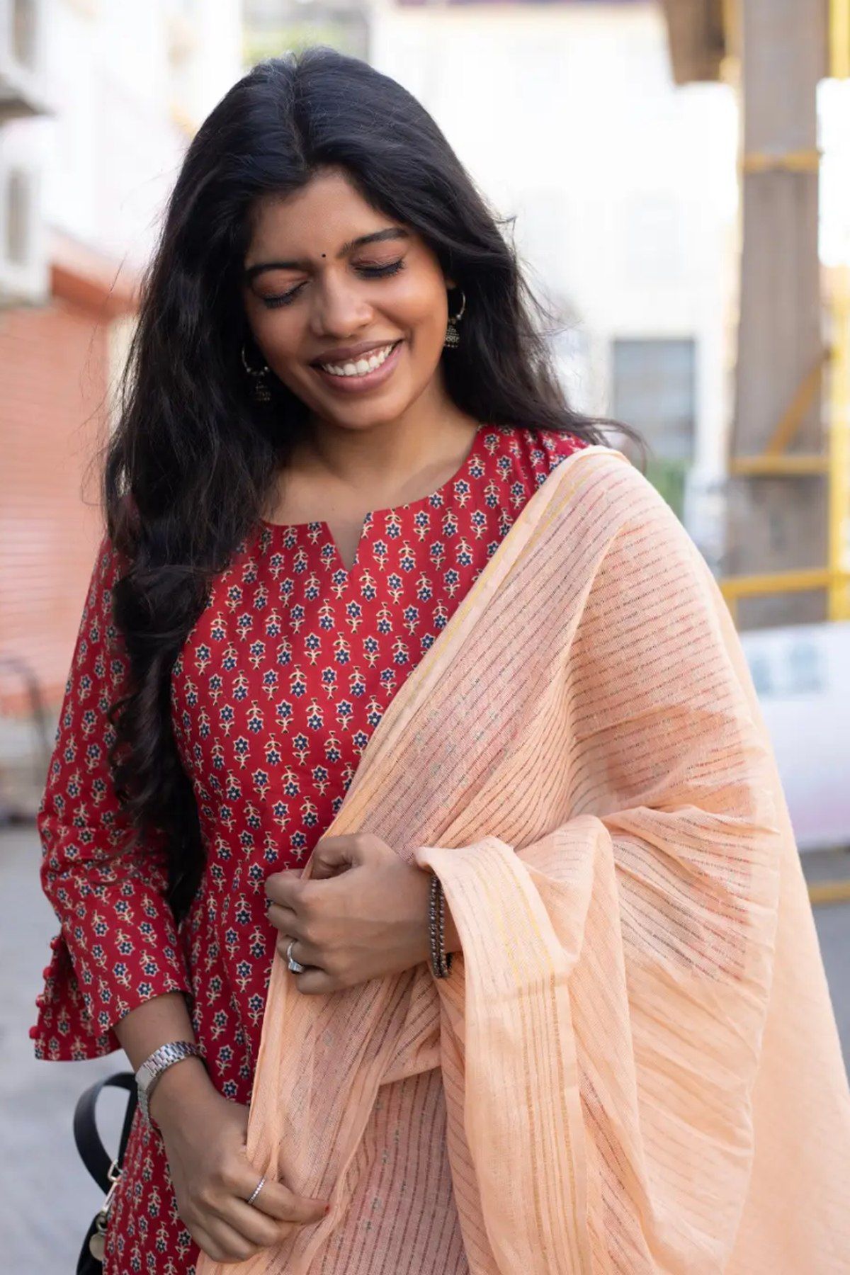 Scarlet buti kurta with peach dupatta, close view